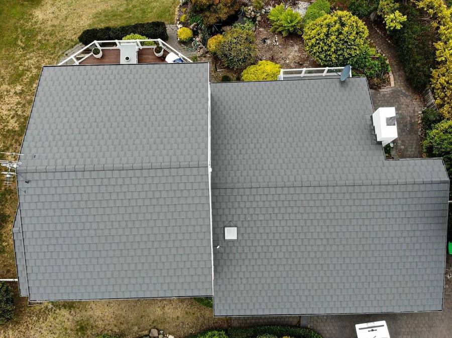 Weathered shingle tile, uniform grey again after coating