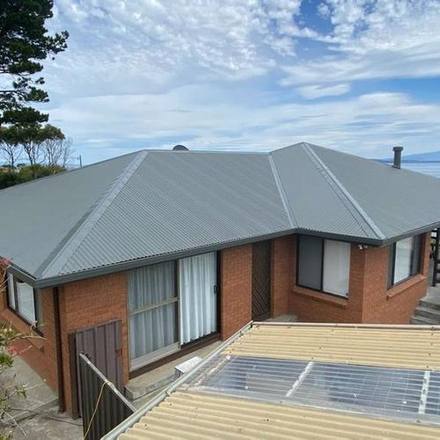 Coastal metal roof after restoration