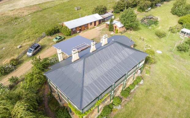 Heritage homestead with wraparound verandah and newly coated roof