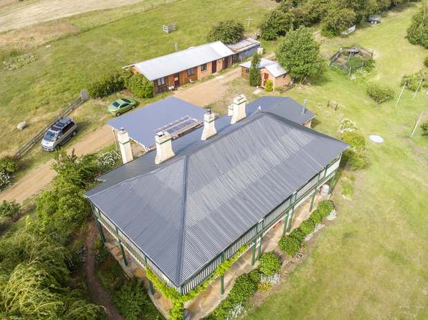 Rural homestead, wraparound verandah after coating