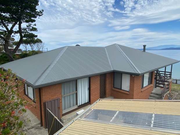 Coastal metal roof, salt-oxidised after coating