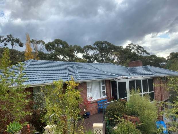 Tiled roof, moss and weathering after coating