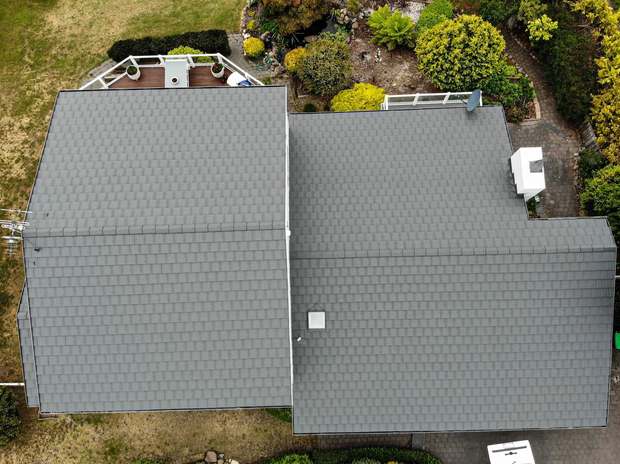 Weathered shingle tile, uniform grey again after coating