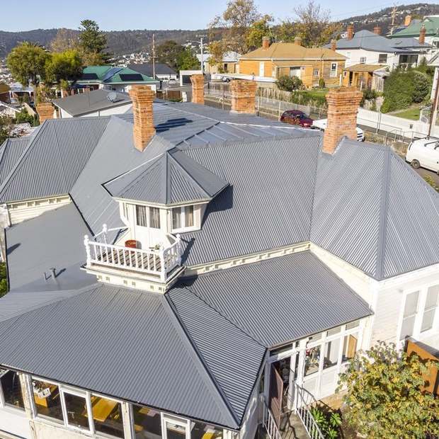 The same heritage roof after cleaning, repair and coating