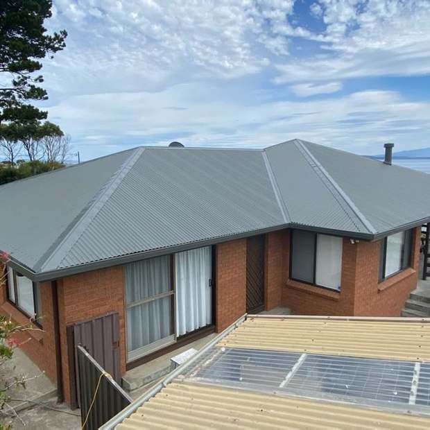 Coastal metal roof after restoration