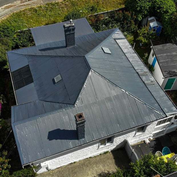 Hip roof finished in charcoal